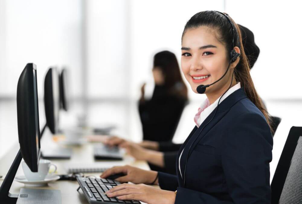 call center agent smiling while on call